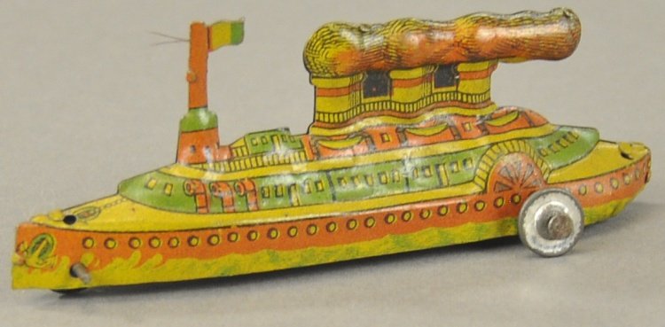 DISTLER BATTLESHIP PENNY TOY: Germany, lithographed tin, well stamped with smoke pouring from stacks, colorful example, wheeled base. 2 1/2" l.