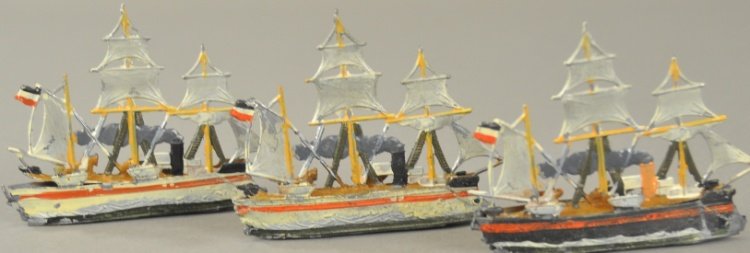 LOT OF THREE STEAM SHIPS: Germany, lead sail ships are hand painted, each with small cannons at bow and stern, three masted examples, each with lifeboat moldings on deck. 4" l.