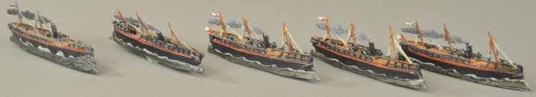 LOT OF FIVE EARLY LEAD SHIPS: Germany, well molded examples, each with long smoke trail, most show three masts, painted in black hulls, red striping, wave marks on sides. 3 5/8" l.