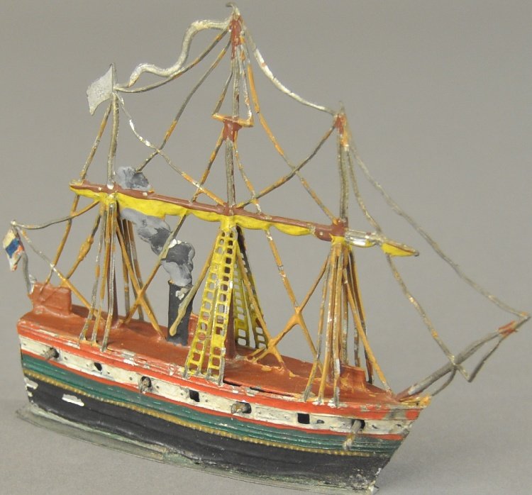 STEAM WARSHIP: Germany, hand painted, features guns peering from hull, three masted vessel with full rigging, smoke cloud emits from stack. 5 1/2" l.