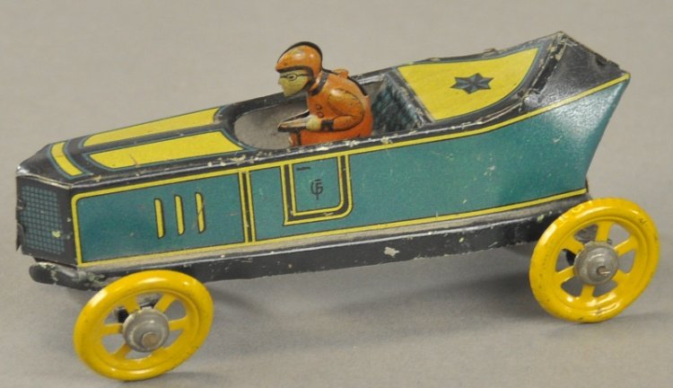 FISCHER RACER PENNY TOY: Germany, lithographed tin, done in blue and yellow body, seated driver, yellow spoke wheels, boat tail rear. 4 1/2" l.