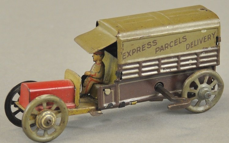 PARCEL DELIVERY TRUCK PENNY TOY: Distler, Germany, lithographed tin, enclosed van body reads, "Express Parcels Delivery," seated driver, clockwork driven. 4" l.