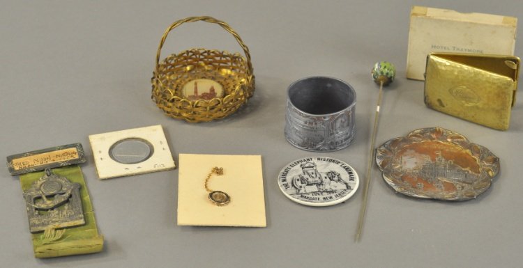 ASSORTMENT OF ATLANTIC CITY MEMORABILIA: Interesting assortment of napkin ring, powder puff holder, candy basket, souvenir pin-back and other trinkets all related to Atlantic City. 2" - 7" l.