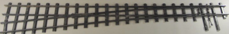 BUDDY 'L' RIGHT HAND SWITCH: All black pressed steel track with left hand switch. 6' 9" x 13" w.