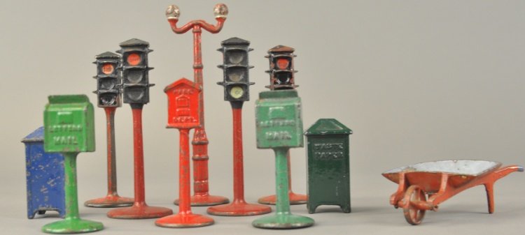 KILGORE ROADSIDE ACCESSORIES: Cast iron, accessories from the Billy Boy play sets, includes: waste cans, mail boxes, traffic signals, lamp post, fire call box, and an added wheel barrow. 3 1/2" - 7 1/4" h.