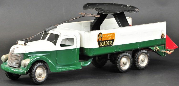 BUDDY 'L' AUTO TAILGATE LOADER: 1950's, pressed steel, cab done in duo-tone green and white, features black seat and steering handle, crank handle operate lift gate, dual rubber tires on rear, complete with original handle and seat.