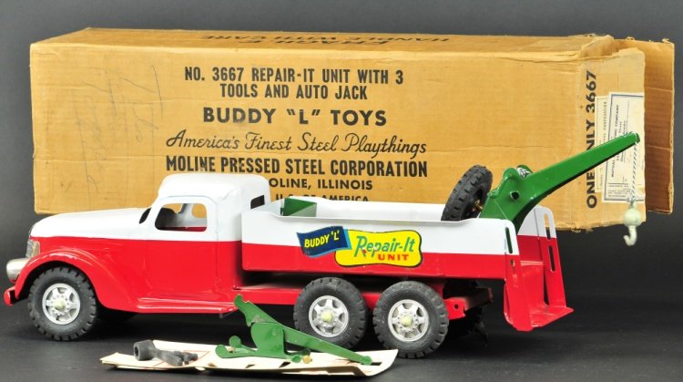 BUDDY 'L' REPAIR-IT UNIT TRUCK: Boxed example, c. 1953, pressed steel truck done in red and white duo tone colors, features boom and spare on open service bed, six wheels, decals on sides. 24 1/2" l.