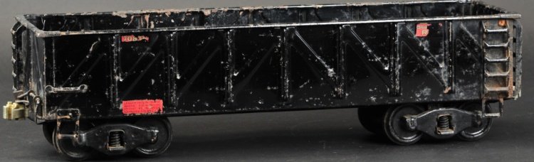 BUDDY 'L' OUTDOOR RAILROAD COAL CAR (GONDOLA): Pressed steel body, painted in black overall, c. 1927, stamped sides, decals read "70826." 22 1/2" l.