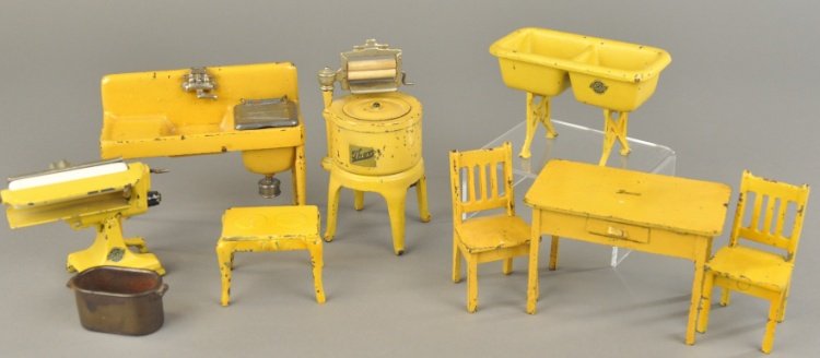 GROUPING OF MINIATURE CAST IRON APPLIANCES: Arcade, lot includes: washer, sink, double wash tub, mangle, table with two chairs and electric range and nickel tub. 1 1/4" - 6" h.