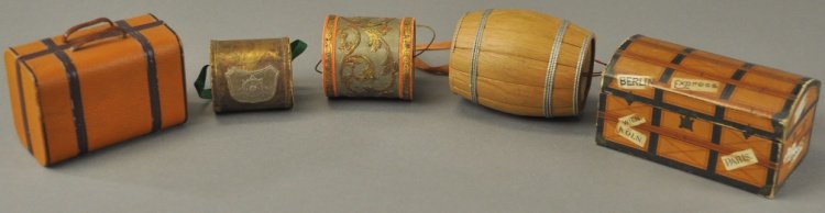 * GROUPING OF TRAVEL LUGGAGE AND GIFT BOXES: Includes Dresden barrel, two carry boxes, truck and piece of leather luggage, all well molded examples. 2" - 4 1/2" h.