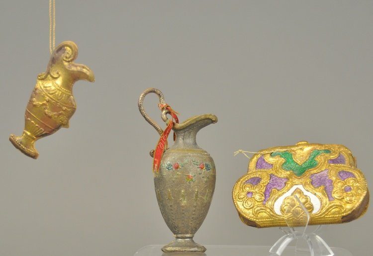 * TWO DRESDEN URNS AND PURSE: Silver urn with ornate handle, golden urn and a fancy purse. 2 1/2" - 4" l.