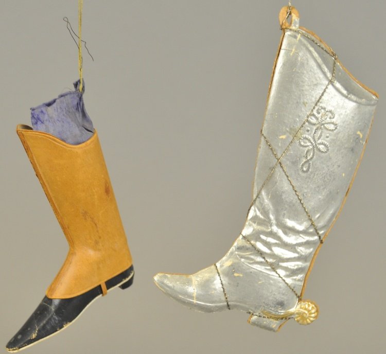 * SILVER COWBOY BOOT AND LADIES CHAPS: Cowboy boot is wire wrapped with spurs, the black ladies boot is wrapped with simulated leather chap, blue silk candy bag at top. 4" - 5" l.