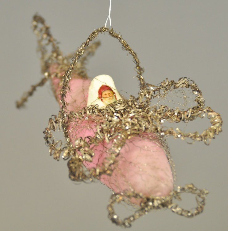 AIRPLANE WITH PLASTER / SCRAP SANTA: Wire wrapped, blown glass airplane, spun wire wings, propeller and tail. 7" l.