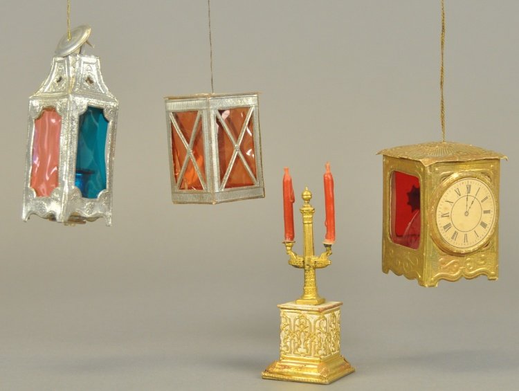 * THREE DRESDEN LANTERNS AND CANDELABRA: Germany, two silver lanterns candy containers, golden lantern with clock and outstanding candelabra candy container, with real wax candles. 2" - 4" l.