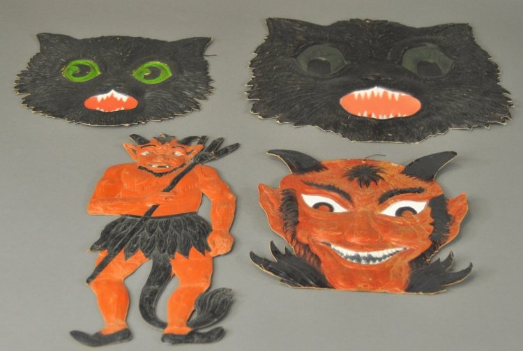 TWO SCARY DEVILS AND TWO BLACK CATS: Germany, pressed cardboard Halloween decorations in the form of two grinning devils and two green eye black cats. 10 1/2" - 15" l.