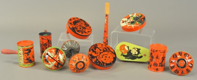 NICE GROUPING OF NOISEMAKERS: Black cats, witches, Jack-O-Lanterns and children, these tin Halloween noisemakers all have wonderful themes and great colors. 4" - 8" l.