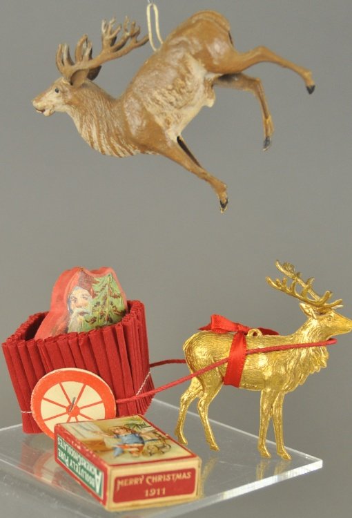 * TWO DRESDEN REINDEER AND TWO CANDY BOXES: Germany, a golden reindeer pulling a candy cart, displaying reindeer and two small candy boxes. 2" - 5" l.