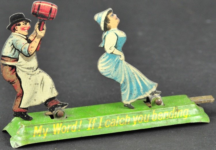 WHIMSICAL MAN CHASING WOMAN PENNY TOY: Germany, possibly Meier, scarce example, flat die-cut figures made of litho tin, front platform reads, "My Word! If I catch you bending." 4" l.