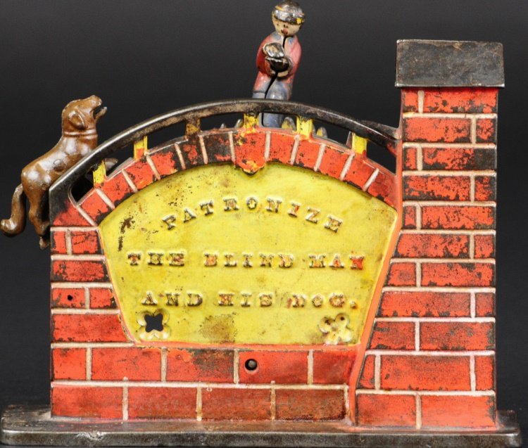 PATRONIZE THE BLIND MAN & HIS DOG MECHANICAL BANK: J. & E. Stevens Co., designed by William H. Lotz, IL, Patented 1878, cast iron and hand painted, yellow and red version, interesting toy concept, place coin in blind man's hand and press lever which c