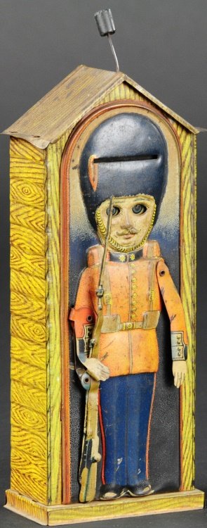 SENTRY MECHANICAL BANK: Saalheimer & Strauss, Germany, circa 1930's, lithographed tin, pressing lever on top causes Sentry to bring rifle to port as eyes turn left and slot becomes ready for coin deposit. 7 1/2" h.