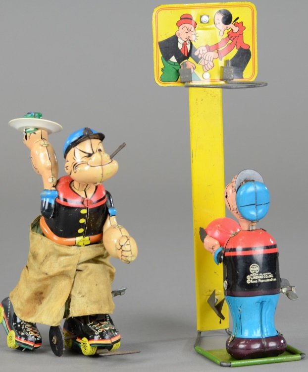 LOT OF TWO POPEYE TOYS: Lot includes Popeye basketball player and Popeye Skater, both lithographed in familiar colors, neither operative, ball not original, missing net and pipes, staining to pants. 6 1/2" - 9" h.