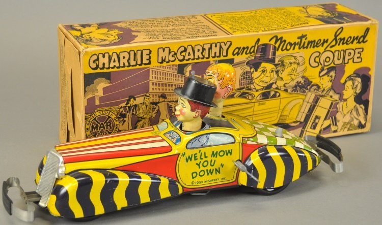BOXED CHARLIE MCCARTHY AND MORTIMER SNERD COUPE: Louis Marx, 1939 copyright, Edgar Bergen, lithographed tin wind-up auto features both characters with spinning heads and car able to reverse direction when striking wall, very colorful with great grap