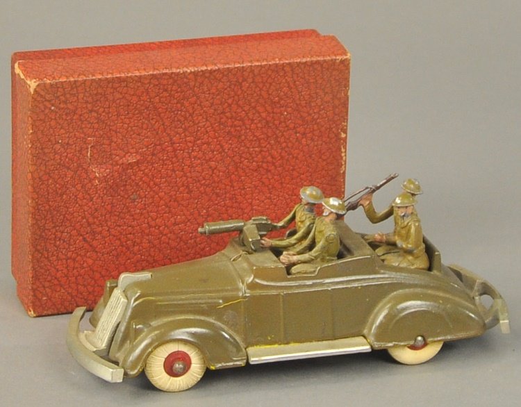 KENTON STAFF CAR WITH FIGURES: Sold by Warren Company, very rare example, made in the late 1930's, designed using Kenton's roadster model fully painted in olive green, features removable machine gun at hood and set of four soldiers