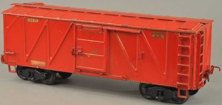 BUDDY 'L' BOX CAR #1002: c. 1926-1931, pressed steel body, painted in red overall, features sliding door on body, decals on doors read "70836," Buddy 'L' decals appear at each end. 20 1/2" l.