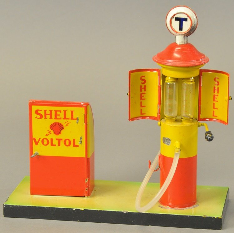 KIBRI SHELL OIL & GAS ISLAND: Germany, painted tin stand for oil and petrol pump, fuel pump has opening doors revealing glass view vials, globe at top, fill valve opens at base. 10" h. x 10" w.
