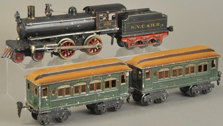 MARKLIN NYC TRAIN SET: Germany, 'O' gauge, 4-4-0 clockwork driven locomotive made for the American market, #1030 black with six wheel tender marked, NYC & HR, together with two eight wheel New York Central passenger cars in