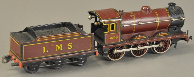 BING 'O' GAUGE LOCOMOTIVE AND TENDER: Germany, includes a clockwork driven 0-6-0 locomotive with six wheel "LMS" tender. 8" l.