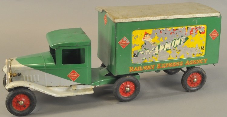 BUDDY 'L' EXPRESS AGENCY TRUCK: c. 1935, pressed steel, electric lights, green and silver enclosed cab, van body has removable roof, opening rear doors, "Wrigley's Spearmint Gum" decals cover sides of body, rubber wheels. 24 1/2" l.