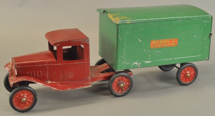 BUDDY 'L' EXPRESS LINE TRUCK: c 1934, pressed steel, red enclosed cab, green box van body with removable roof, fold-down tailgate, embossed rubber wheels. 23 3/4" l.