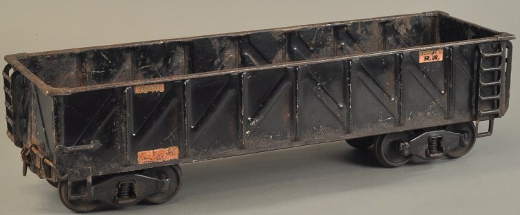 BUDDY 'L' OUTDOOR RAILROAD COAL CAR (GONDOLA): Pressed steel body, painted in black overall, c. 1927, stamped sides, decals read, "70836." 20 1/2" l.
