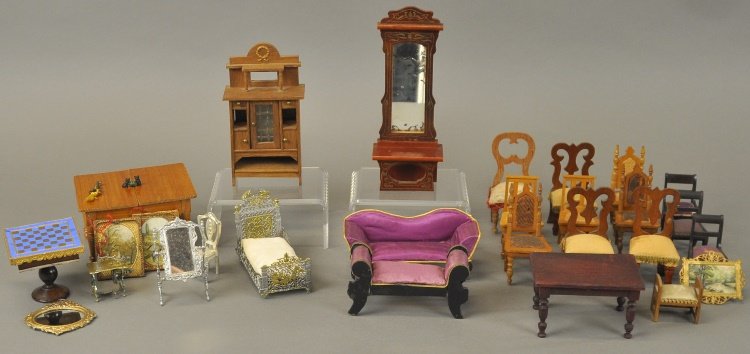 MISCELLANEOUS DOLLHOUSE FURNISHINGS & ACCESSORIES: circa 1850-1900, large lot of assorted furnishings including two picture frames, filigree framed mirror, checkerboard table, five Schneegas chairs, oak table with four cutout back chairs, red stain pi