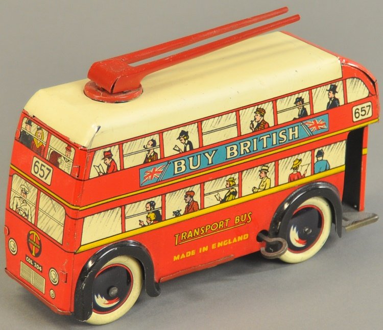 BRIMTOY TRANSPORT BUS: England, c. 1940's, lithographed tin, very colorful graphic imagery, sides read, "Buy British," key wind operated, electric poles at roof. 8" l.