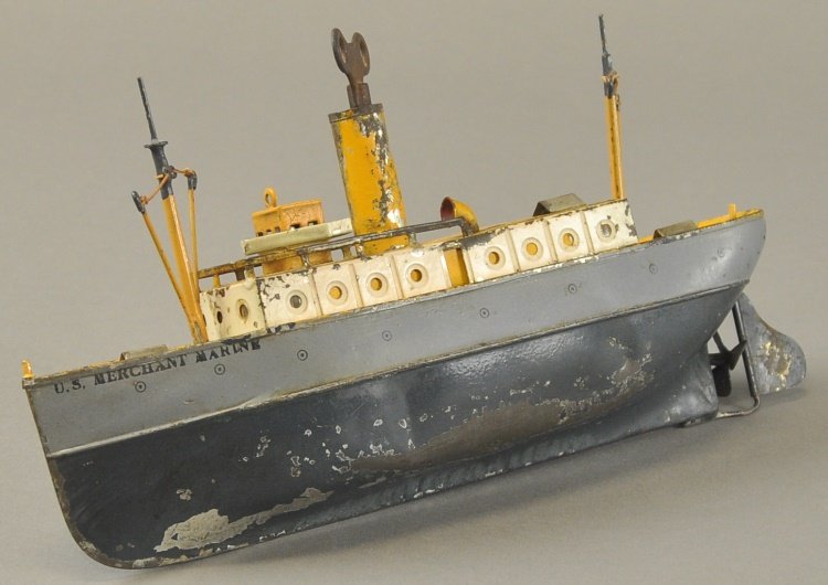 U.S. MERCHANT MARINE FREIGHTER: Ives Toys, hand painted, grey hull with yellow upper deck and cabin, features single funnel and stack, two masts, clockwork driven, pilot's house on deck. 13" l.