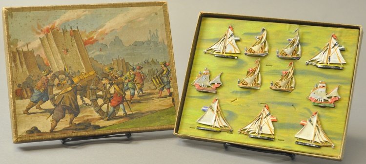 BOXED SHIP SET: Hand painted lead sailing vessels, very colorful and detailed overall, these are miniature sized, set in slotted interior card, there are several unusual slots, not confirmed if anything missing. Box