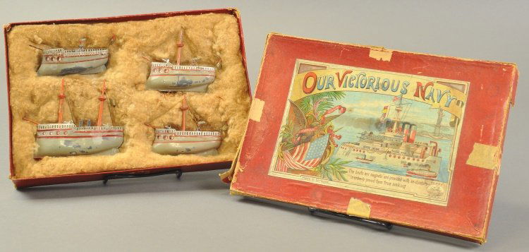 UBELACHER "VICTORIOUS NAVY" BOXED SHIP SET: Germany, hand painted examples, includes: four lead ships with varied deck appointments, each done in grey hull, red striped, fully railed, three feature tall mast with rigging, all set in original co