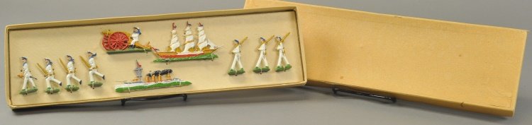 BOXED NAUTICAL SET: Hand painted lead examples, set includes seven sailors, warship, three masted sailing vessel and sailor firing cannon, nice detail to paint. Box 4 3/4" - 16 3/4".