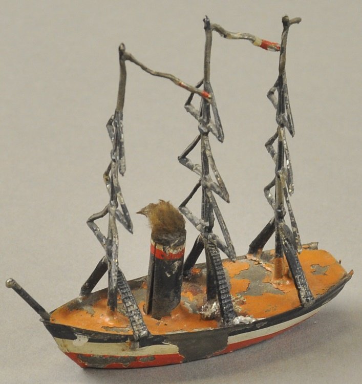 HEYDE WARSHIP: Germany, hand painted lead, circa 1890's, features solo stack with cotton smoke and three masts with full rigging. 3 1/4" l.