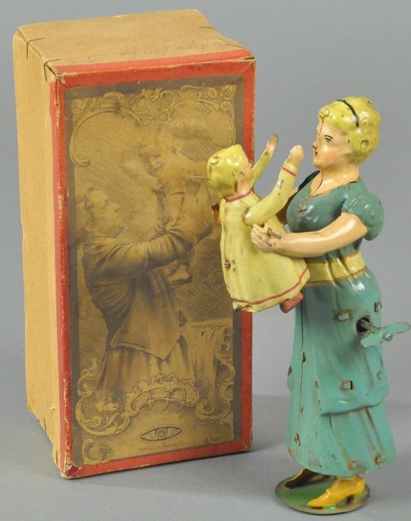 MECHANICAL WOMAN HOLDING CHILD (1 of 3)