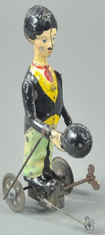 CHARLIE CHAPLIN TOY FIGURE (1 of 2)