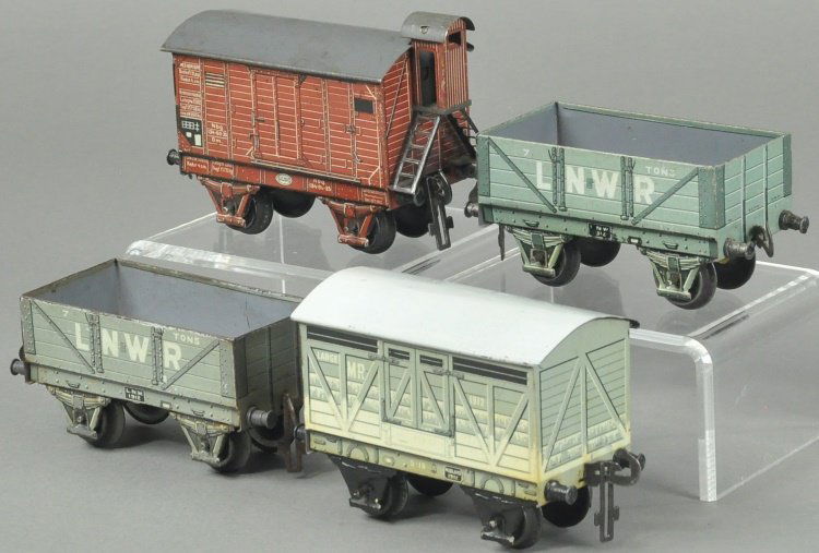 FOUR CARETTE FREIGHT CARS (1 of 2)
