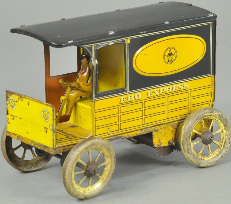 HANS EBERL "EXPRESS DELIVERY VAN": Germany, c. 1920's, lithographed tin, panel van has opening doors, made for American market, van side reads, "EBO EXPRESS," clockwork driven, seated driver. 7 1/2" l.