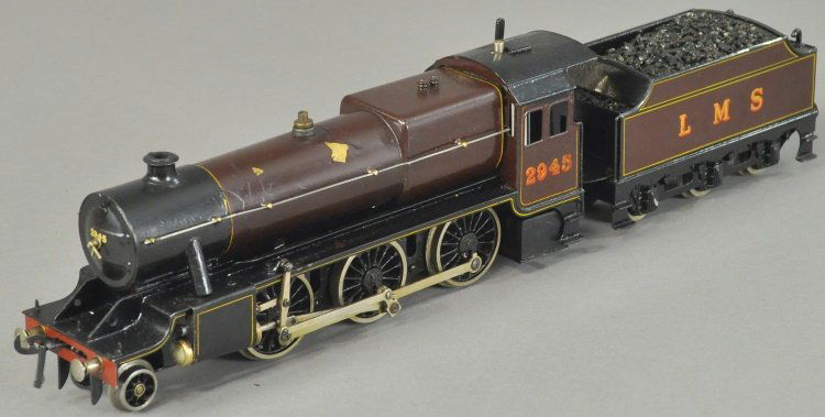 BASSETT-LOWKE 2-6-0 #2945 LOCOMOTIVE AND TENDER: Steam type Mogul, 'O' gauge in maroon body, comes with six wheel L.M.S. tender.