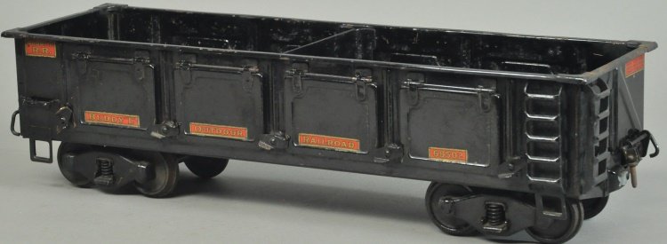BUDDY 'L' OUTDOOR RAILROAD BALLAST CAR #1008: Pressed steel body, painted in black overall, c. 1927, stamped sides with opening doors, decals read, "68502." 22 1/2" l.