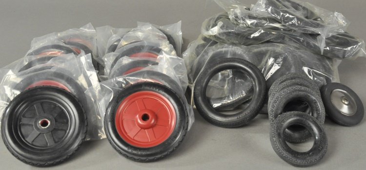 EXTENSIVE GROUPING OF REPLACEMENT WHEELS AND TIRES: Grouping includes replacements: treaded rubber tires, bald rubber tires, and treaded rubber wheels with metal wheels.