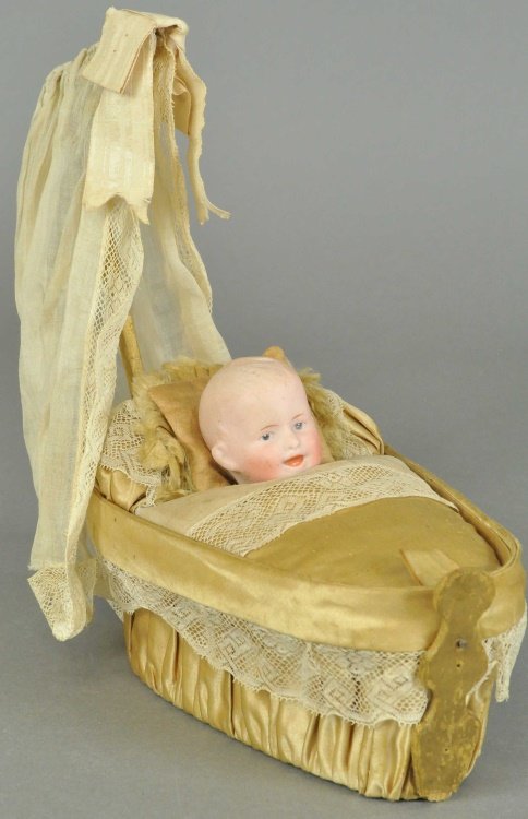 DOLL IN CRIB CANDY CONTAINER (1 of 2)