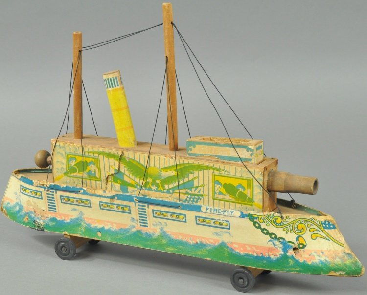BLISS FIRE FLY GUNBOAT: Colorful lithographed paper on wood and cardboard, features shooting, nice graphics with rampant American eagle. 17 1/2" l.